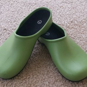 Green rubber clogs
